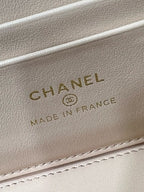 Chanel logo and "Made in France" on light beige leather inner label.