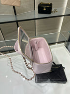 Chanel light pink mini bag open view showing interior lining and chain strap