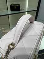Chanel light pink textured leather mini bag with chain strap and gold zipper pull