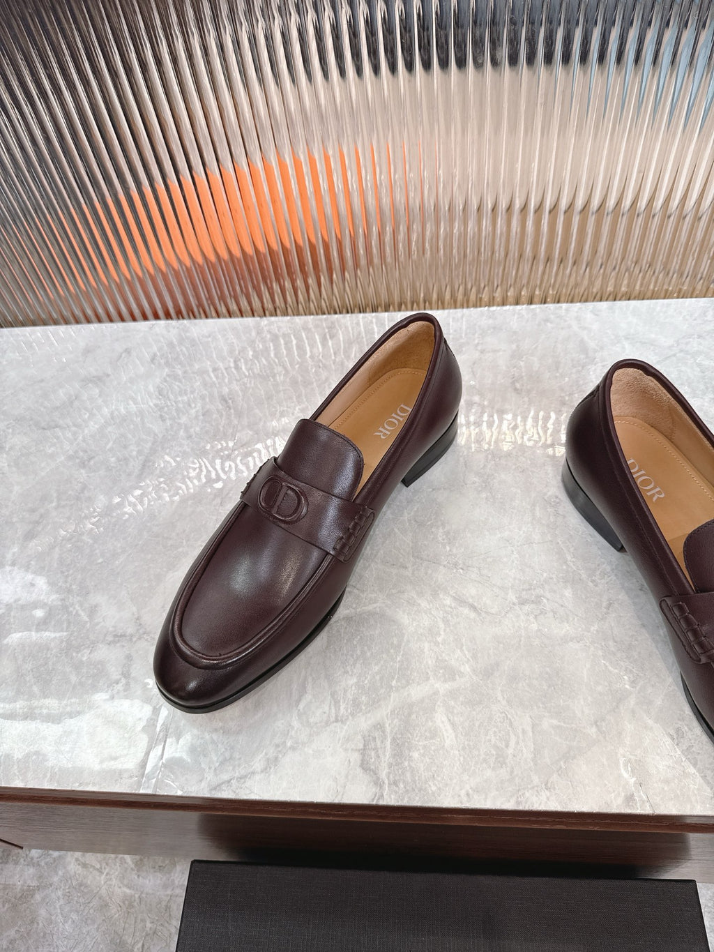 Burgundy leather loafer with DD strap detail, rounded toe and low heel