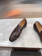 Burgundy leather loafer with DD strap detail, rounded toe and low heel