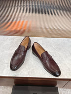 Pair of burgundy leather loafers with DD strap detail and low sole