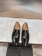 Dior unisex black leather loafers with logo buckle on upper