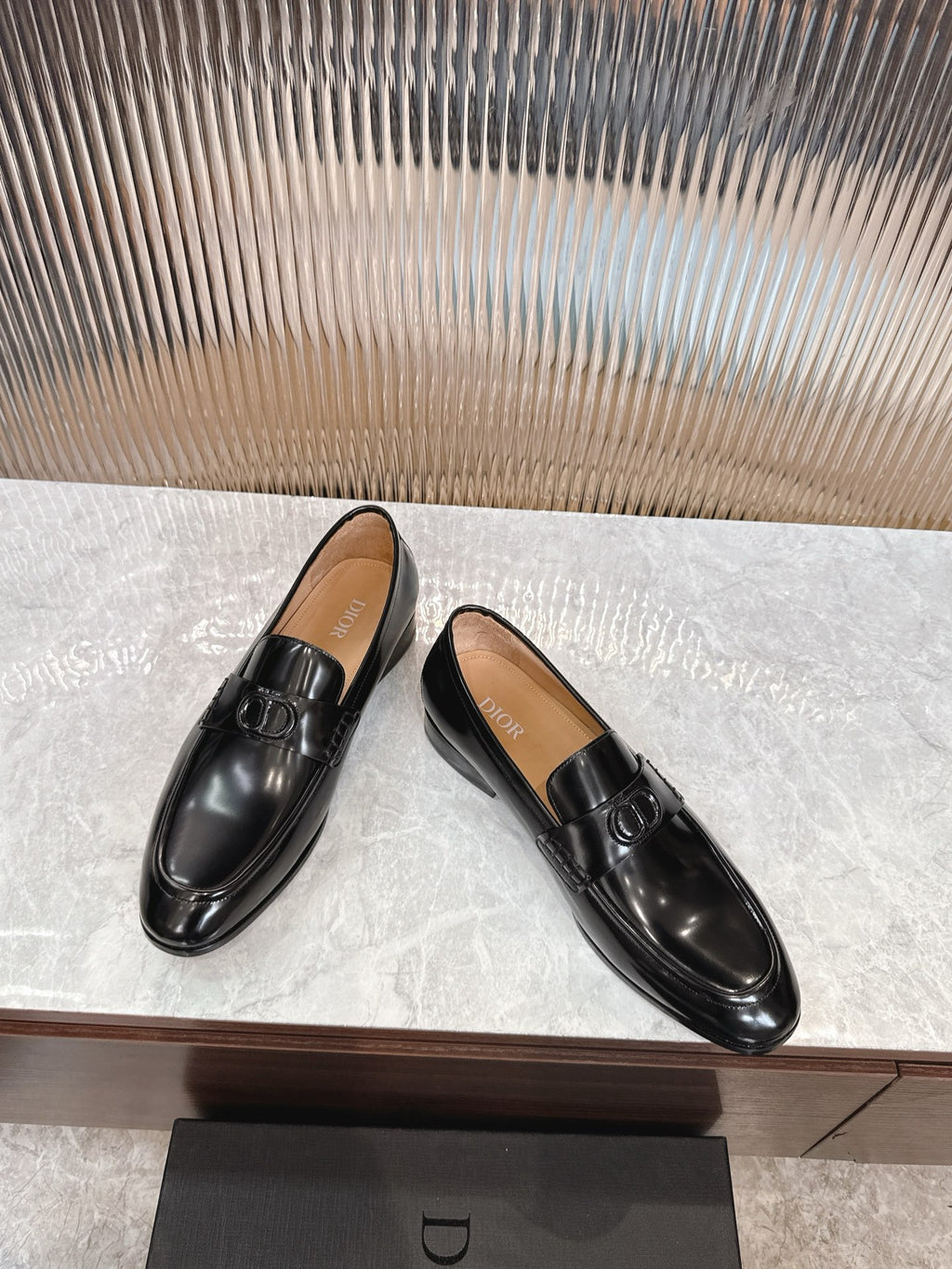 Pair of Dior unisex black leather loafers with square buckle detail