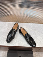 Pair of Dior unisex black leather loafers with square buckle detail