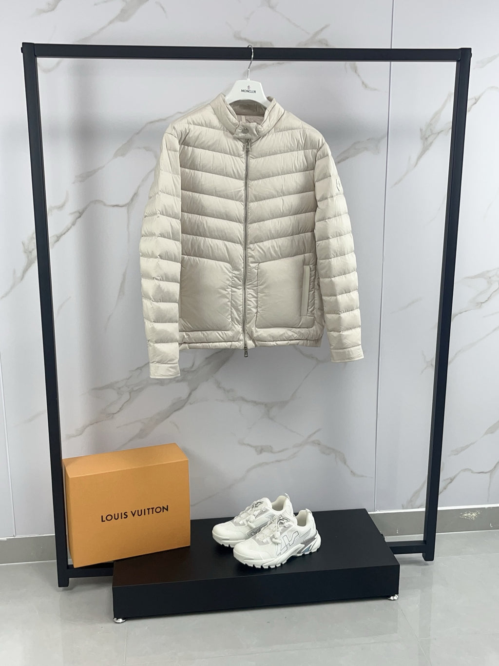Moncler light beige quilted puffer jacket front, visible side pocket details