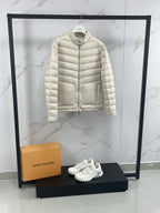Moncler light beige quilted puffer jacket front, visible side pocket details