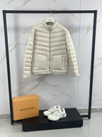 Moncler light beige quilted puffer jacket with full-length zipper and side pockets