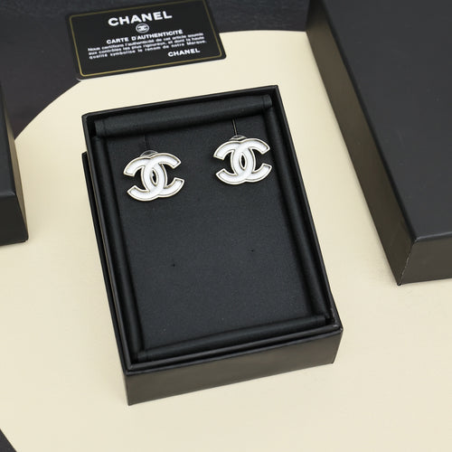 Chanel CC logo earrings with silver-tone and black enamel in gift box