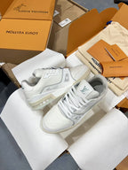 White Louis Vuitton trainer sneakers with side LV emblem and lace-up closure, in box