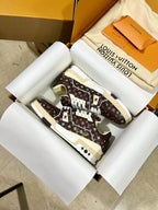 Louis Vuitton trainer shoes in dark brown monogram with white laces and platform sole