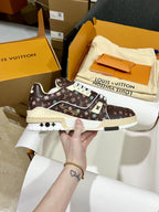 Louis Vuitton trainer shoes in dark brown monogram canvas with white laces and sole