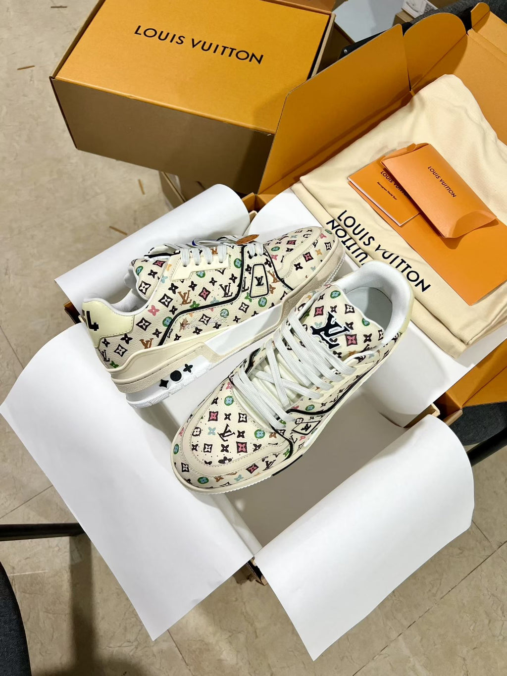 Louis Vuitton lace-up sneakers with white multicolor monogram upper and thick white sole