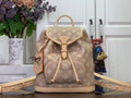 Louis Vuitton monogram backpack with drawstring top, tan leather trim, and top handle