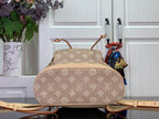 Louis Vuitton monogram backpack with wide rounded body, tan trim, and adjustable straps