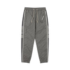 Dior pants in dark gray with elastic drawstring waist and side logo stripe