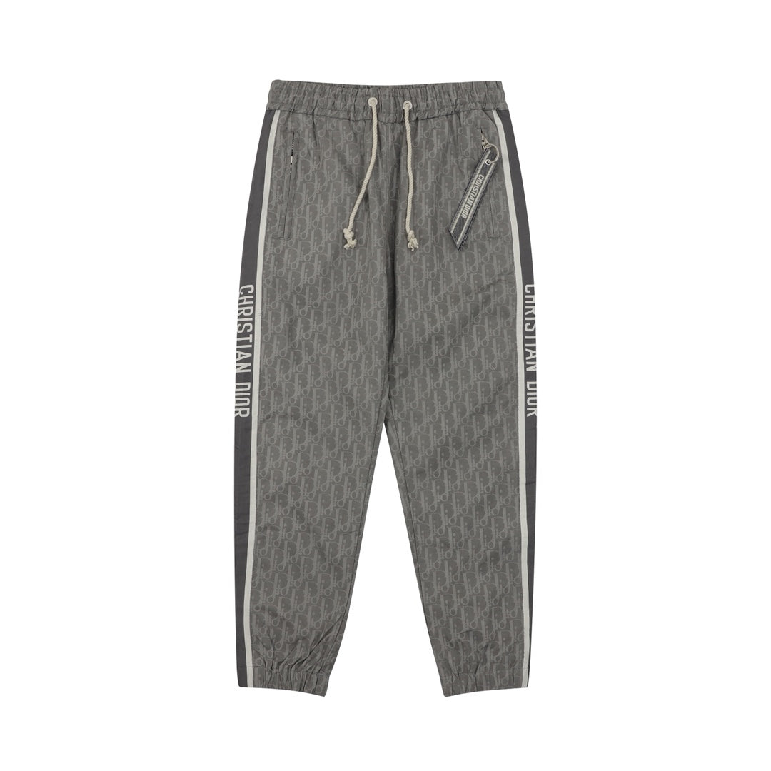 Dior pants in dark gray with elastic drawstring waist and side logo stripe