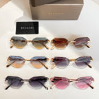 Set of six gold-tone sunglasses with multicolor tinted lenses and rhinestone-accented temples