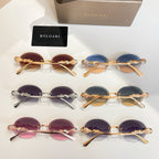 Bvlgari sunglasses set with multiple pairs, tinted lenses, gold-tone and silver-tone frames