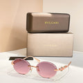 Bvlgari round sunglasses with gold-tone frame and rose-pink tinted lenses