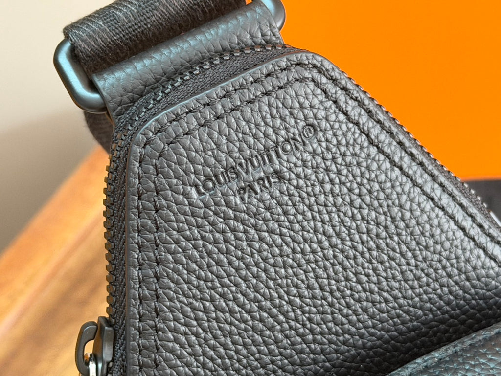 Louis Vuitton men's crossbody bag textured leather with embossed logo on front panel