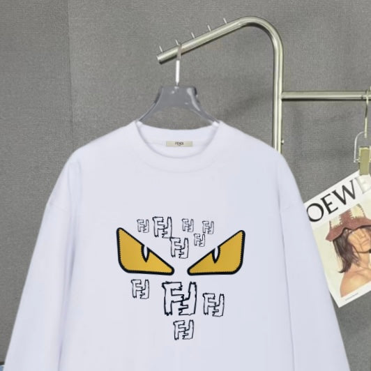 White crew-neck sweatshirt with centered yellow eye graphic and black geometric letters
