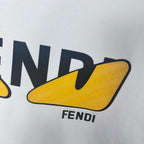 Close-up of FENDI lettering on white sweatshirt with yellow shield logo