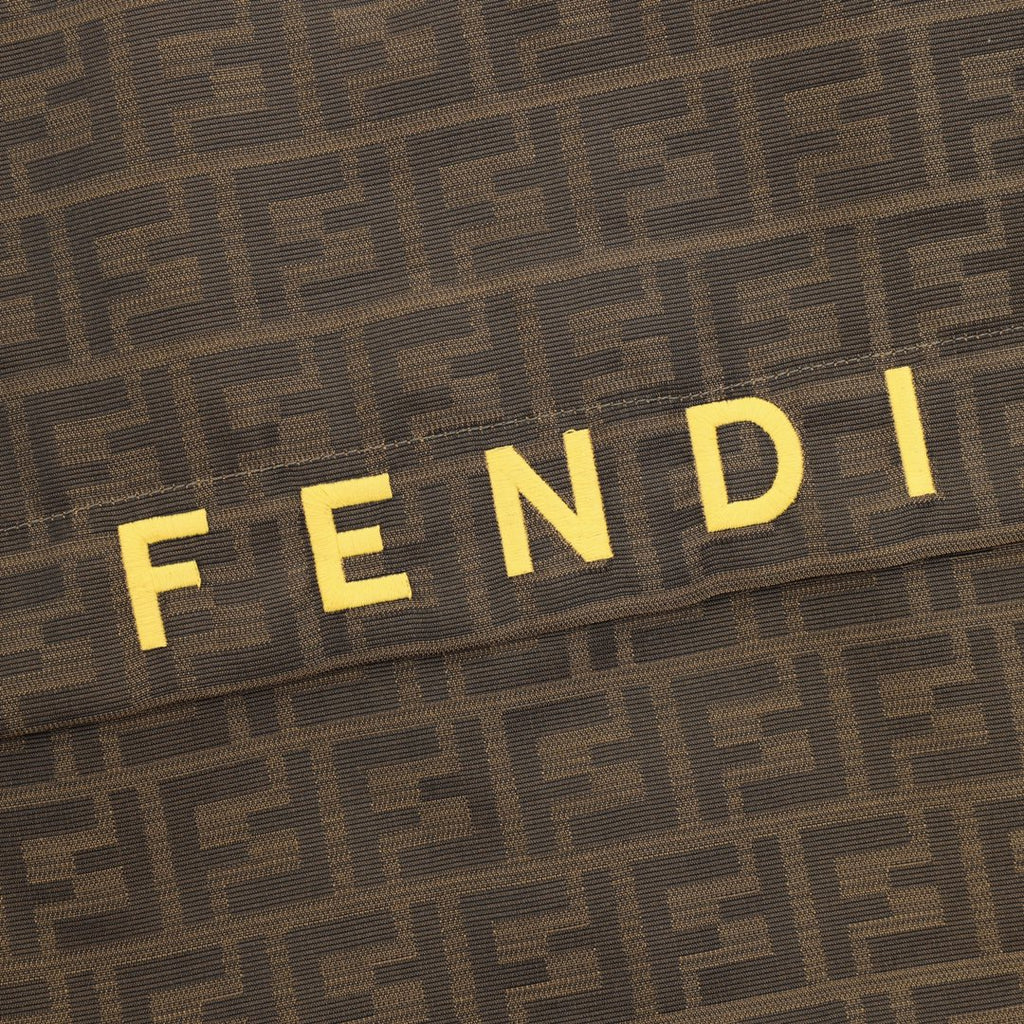 Brown FF hooded jacket chest shows yellow 'FENDI' lettering.