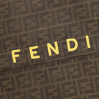Brown FF hooded jacket chest shows yellow 'FENDI' lettering.