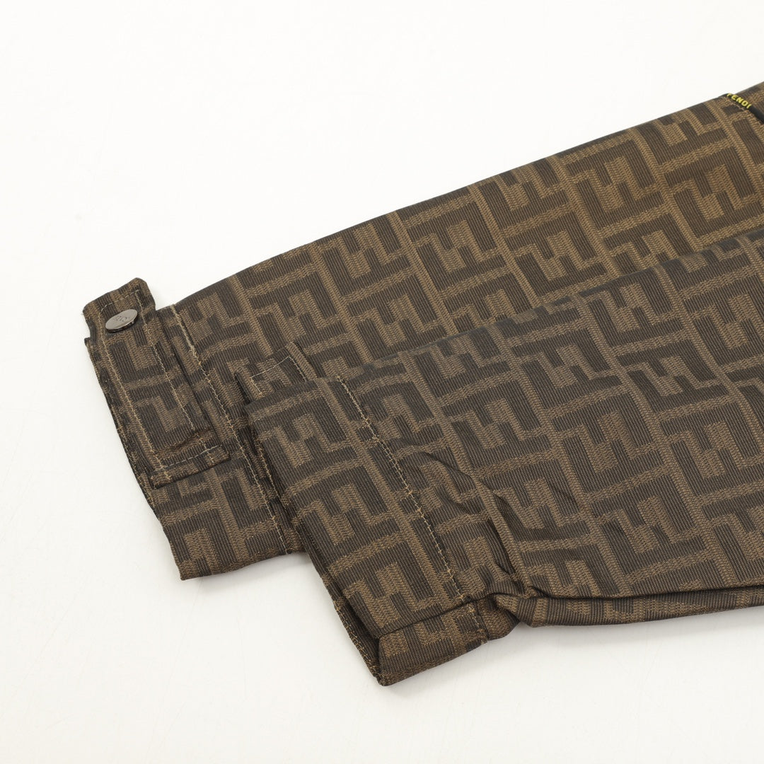 Brown FF hooded jacket bottom hem with drawcord and metal snap at edge.