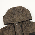 Brown Fendi hooded jacket close-up with FF pattern, hood lining and snap placket.