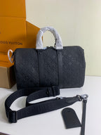Louis Vuitton monogram handbag with detachable strap and small pouch, dark gray/black