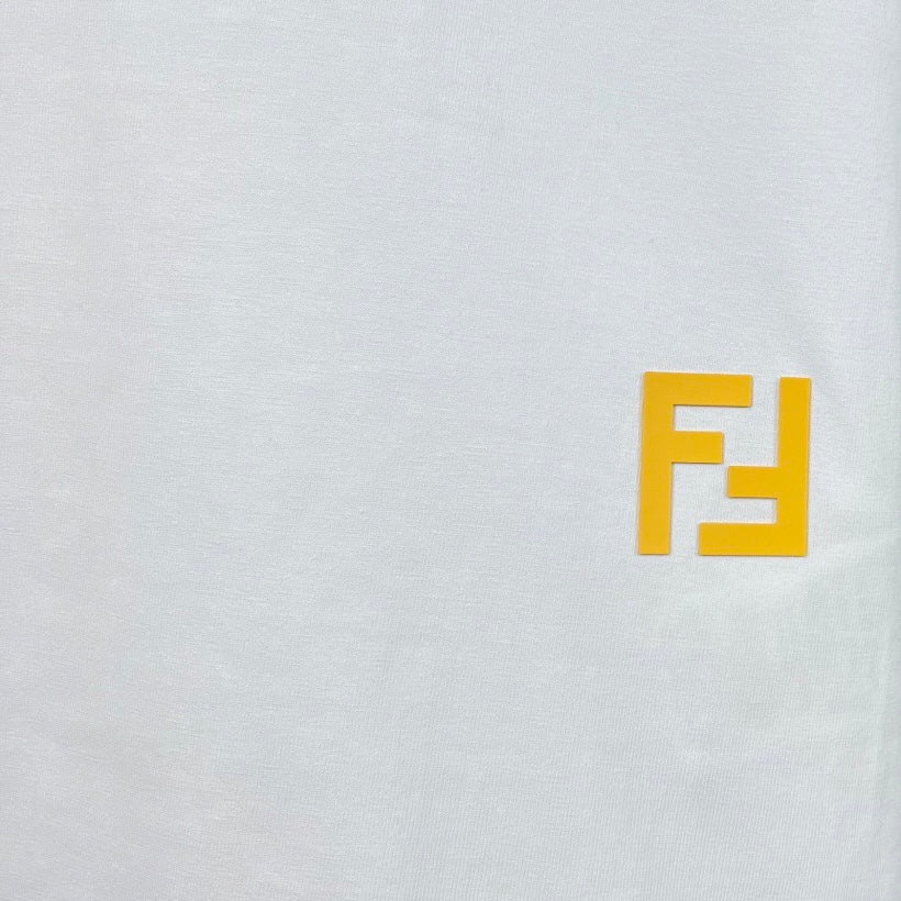 White sweatshirt with small yellow F logo detail at the chest