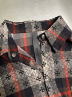 Shirt collar and button placket with dark plaid trim and floral print