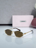 Miu Miu sunglasses with brown lenses, gold-tone frames, and dark brown temple accents