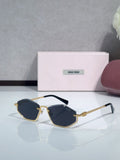 Miu Miu sunglasses with dark blue hexagonal frames and gold-tone metal temples