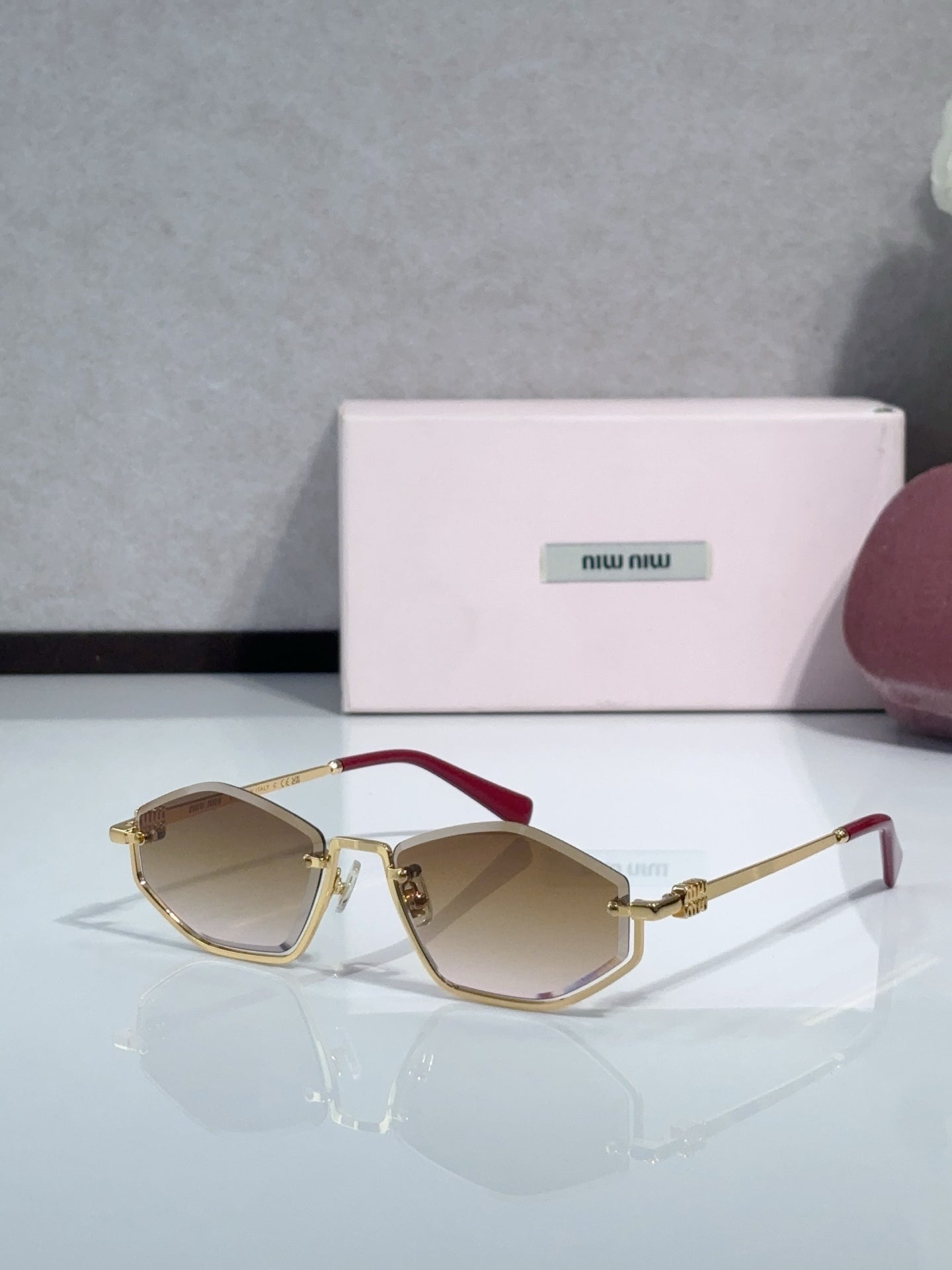 MiuMiu Glasses