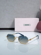 Gold metal hexagonal sunglasses with light blue lenses and navy temple detailing