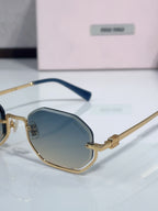 Gold hexagonal sunglasses with dark blue lenses and blue acetate temple arms