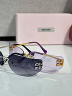 MiuMiu sunglasses with dark blue lenses, gold frame and purple accents