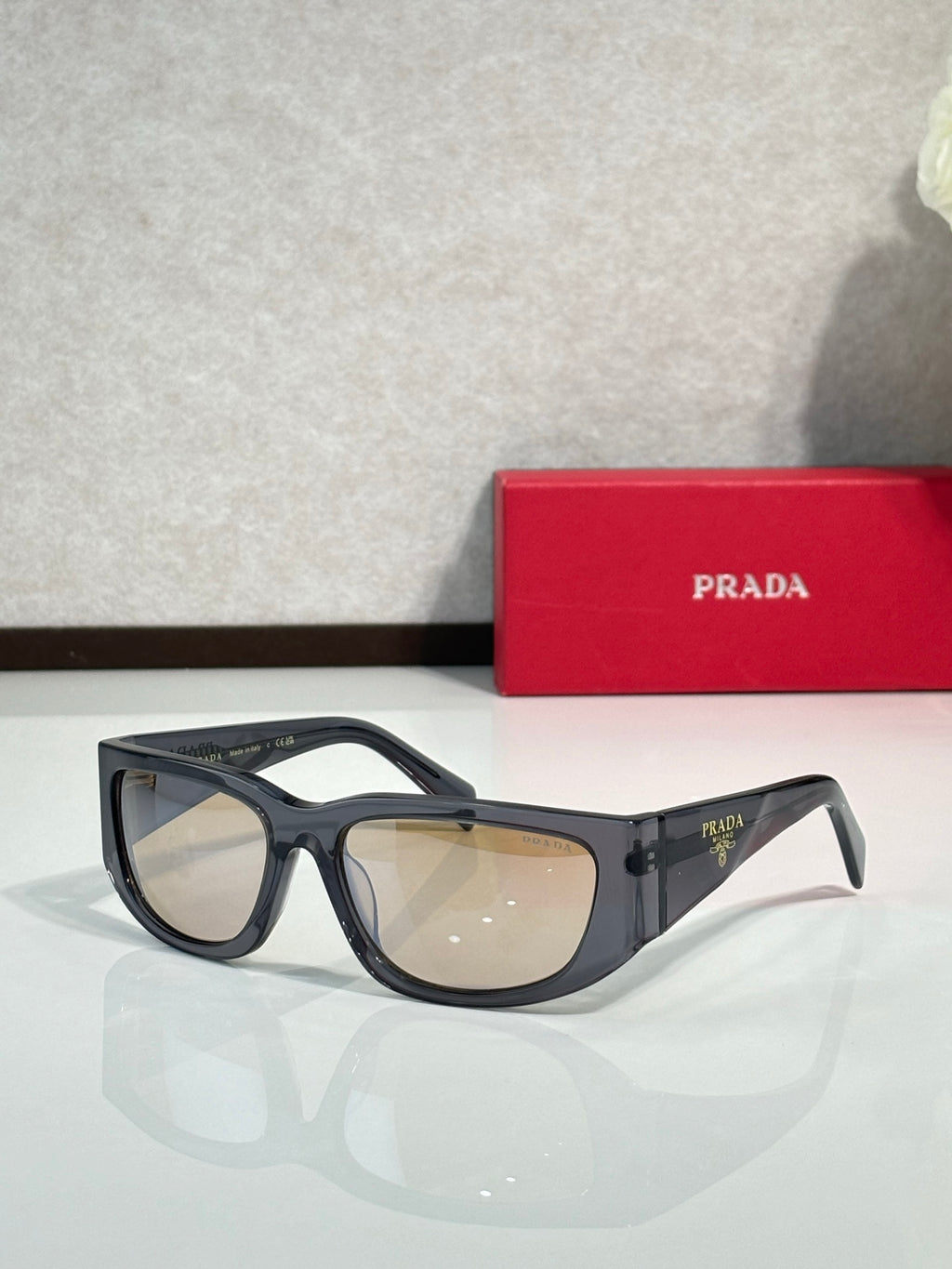 Prada glasses with black oversized frames and tinted lenses