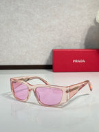 Prada glasses with rose gold frames and pink tinted lenses