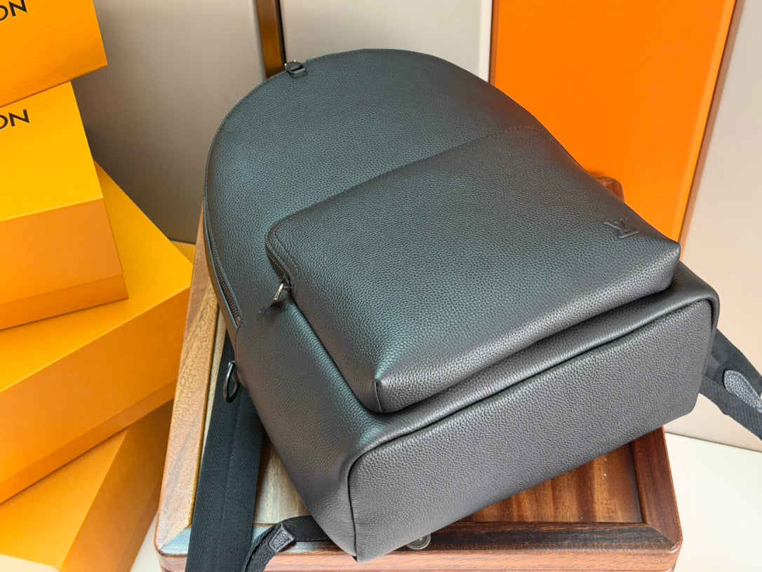 Leather backpack top section with structured flap, dark teal
