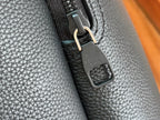 Leather strap buckle with Louis Vuitton engraving, dark teal