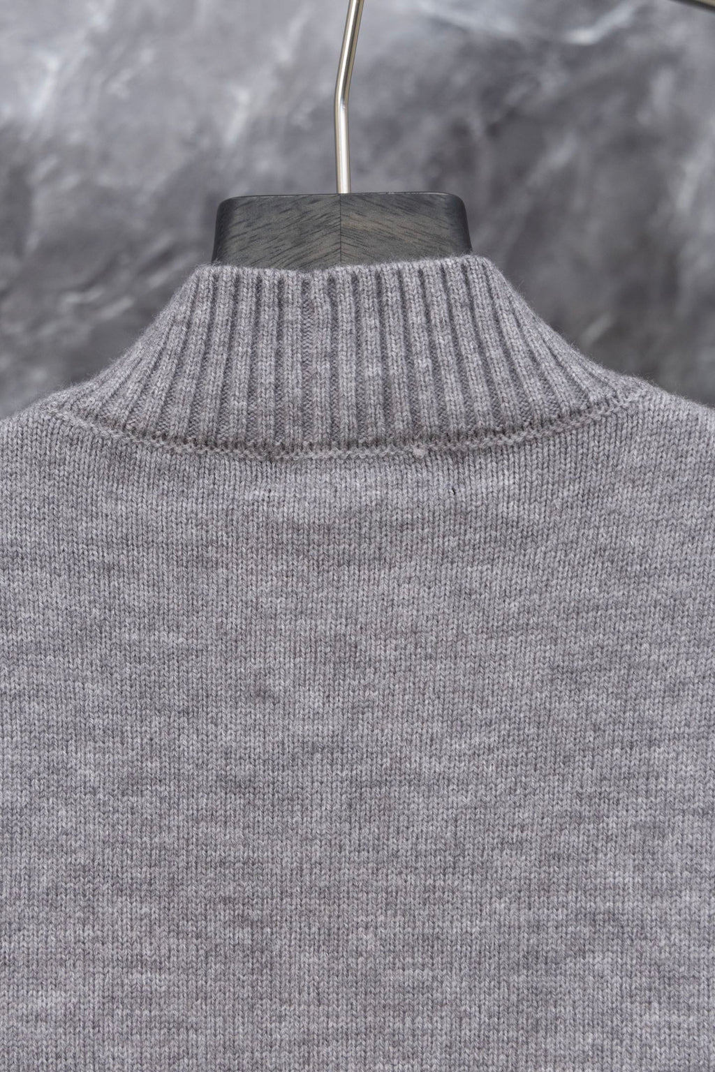 Gray Prada knit sweater with ribbed turtleneck collar, upper back view