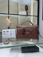 Chanel burgundy quilted mini shoulder bag with chain strap and top handle