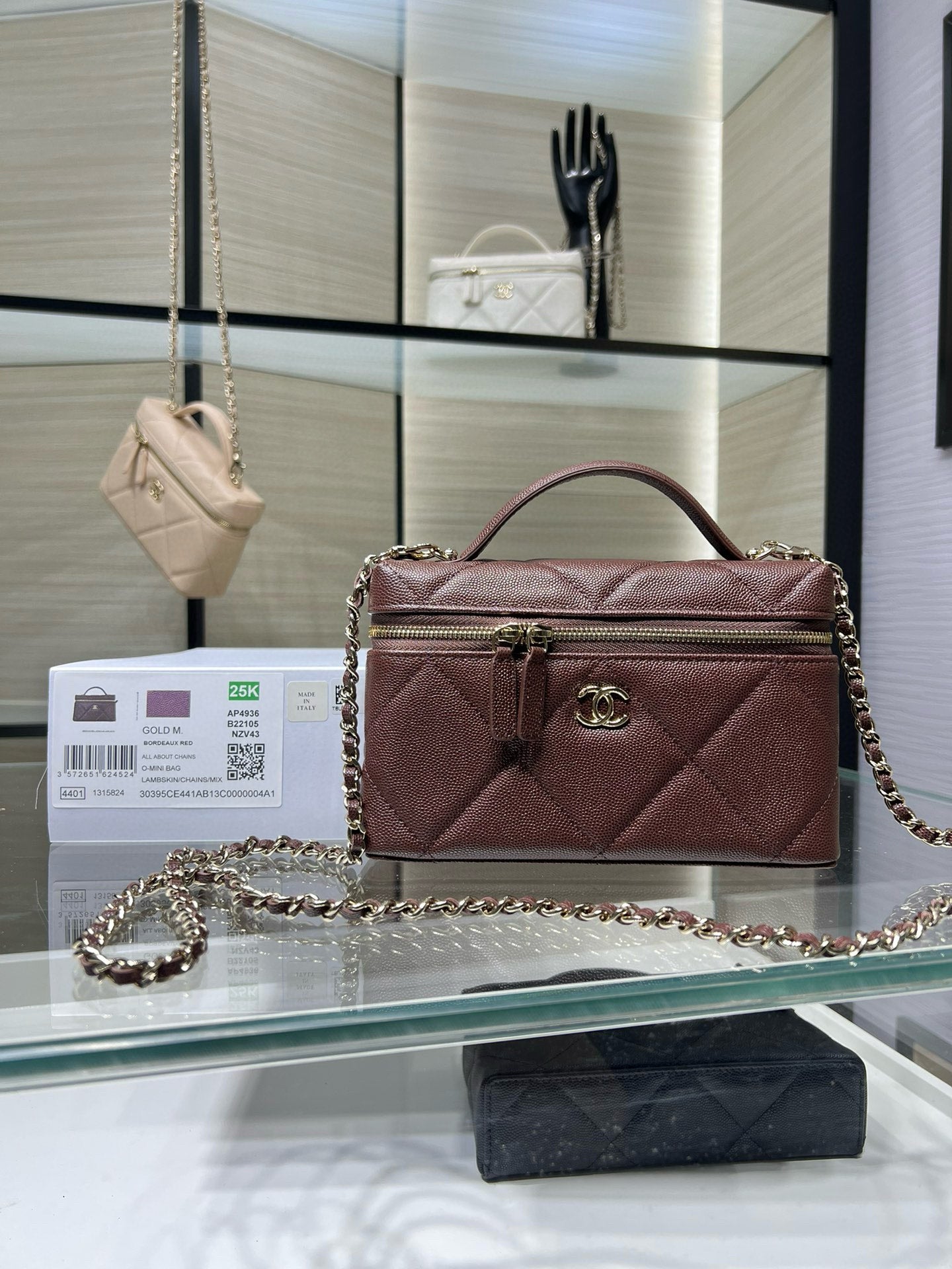 Chanel burgundy quilted mini shoulder bag with chain strap and top handle