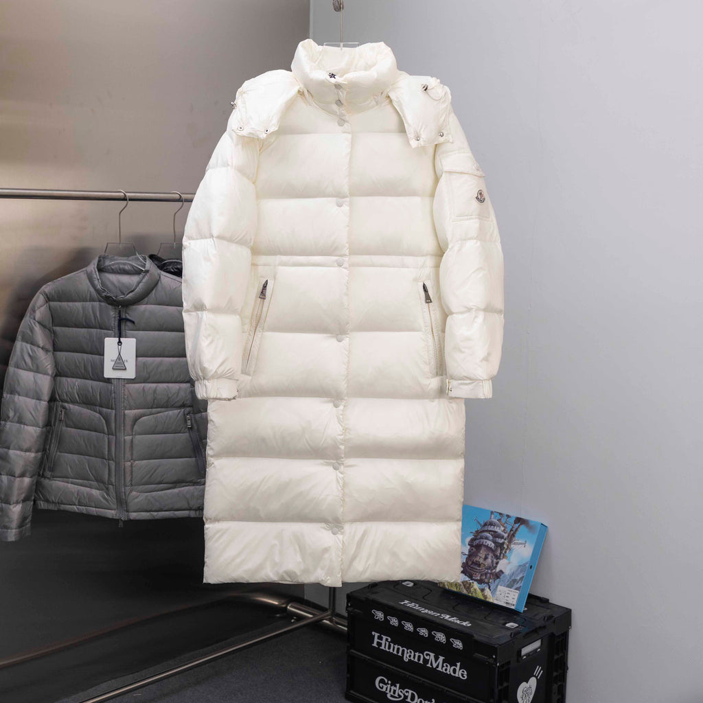 Long white puffer jacket with hood and zip front, snap details and side pockets