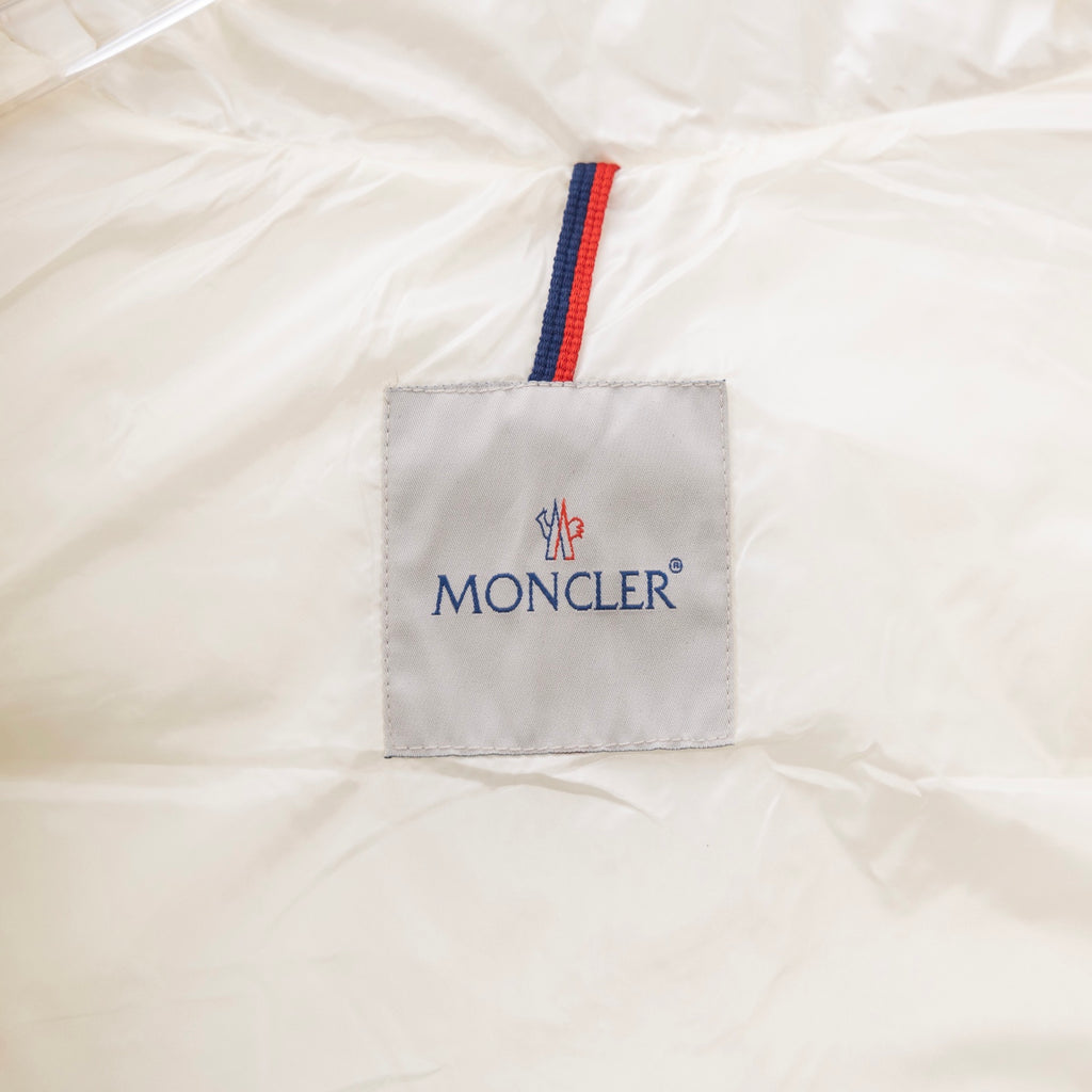 Moncler logo patch on white hooded jacket with red and blue stripe trim