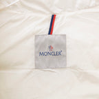 Moncler logo patch on white hooded jacket with red and blue stripe trim